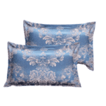 Taie d'oreiller satinée à motifs jacquard dans des tons de bleu et de gris.